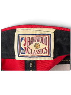 JAKE & IPI Chicago Bulls cap featuring an embroidered NBA Hardwood Classics interior label on red fabric