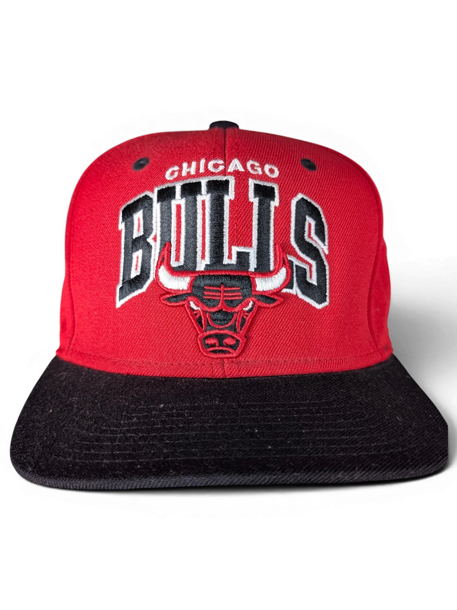 JAKE & IPI red and black Chicago Bulls snapback cap with embroidered team logo and lettering
