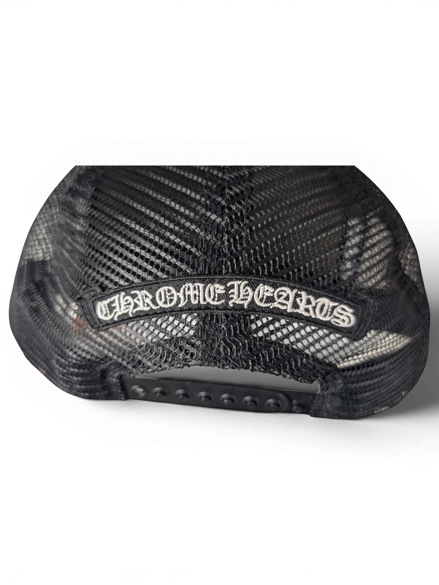 JAKE & IPI black Chrome Hearts trucker cap with mesh back and adjustable snapback closure