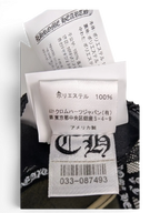 JAKE & IPI Chrome Hearts cap interior label showing 100 percent polyester material and brand logo details