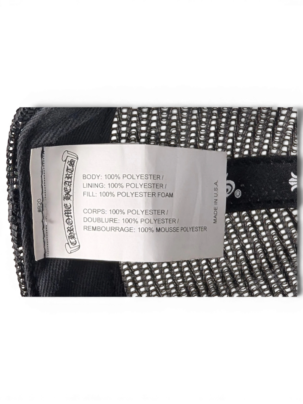 JAKE & IPI Chrome Hearts trucker hat interior label showing 100 percent polyester material composition