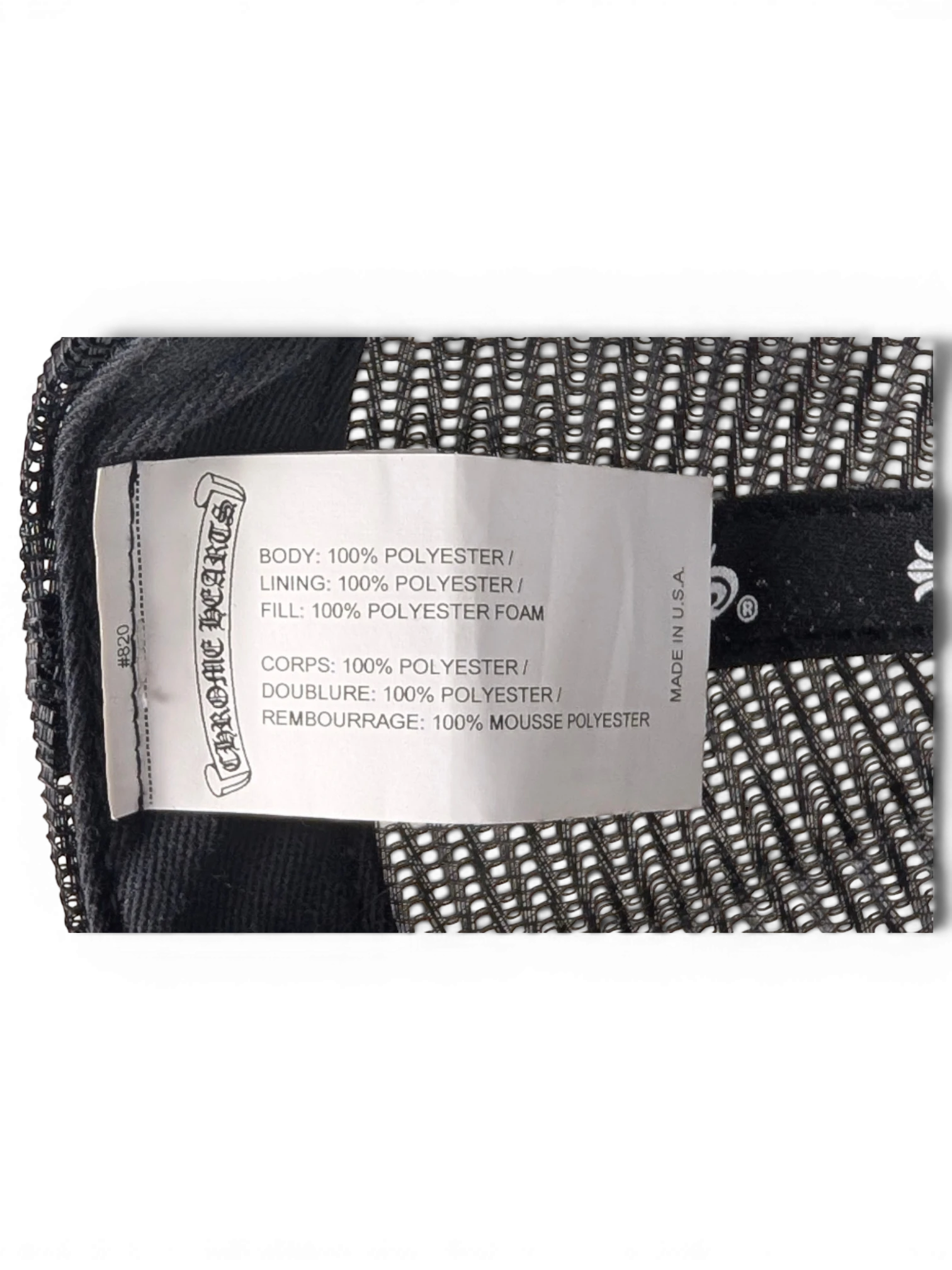 JAKE & IPI Chrome Hearts trucker hat interior label showing 100 percent polyester material composition