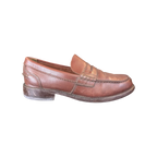 JAKE & IPI Clarks brown leather penny loafers with classic moccasin stitching and a low stacked heel.