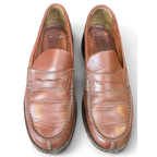 JAKE & IPI vintage Clarks brown leather penny loafers with classic slip-on design and worn-in patina