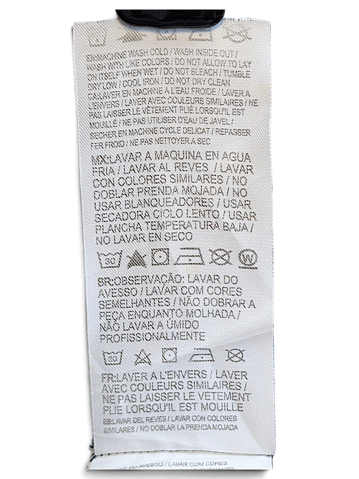 JAKE & IPI Converse Cropped College garment care label with multi-language washing instructions