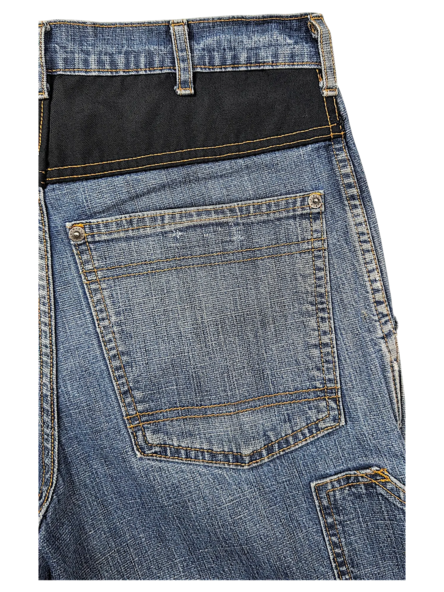 JAKE & IPI Cordura brand fabric jeans featuring blue denim with a contrasting black reinforced back panel and stitching.