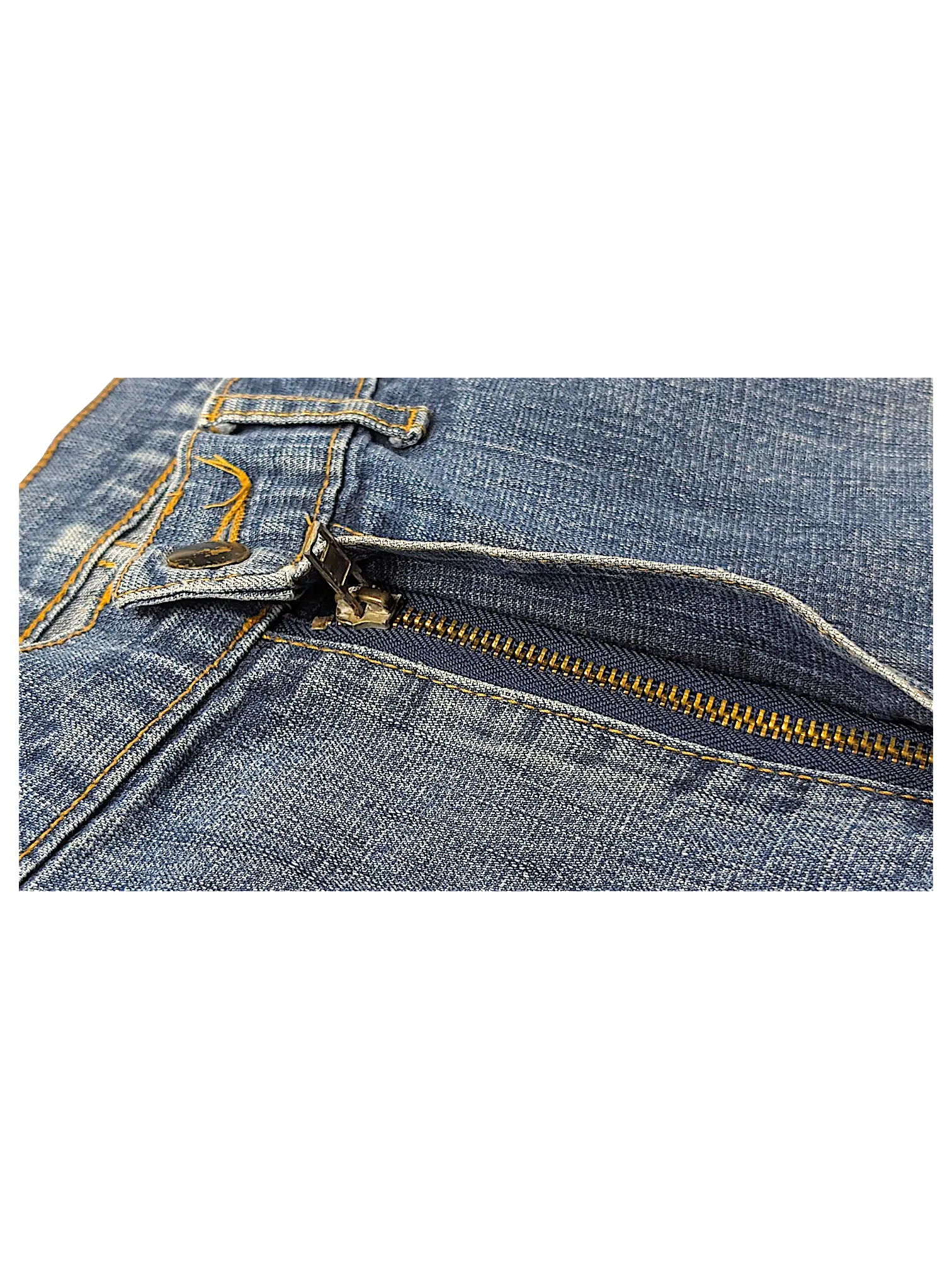 Close-up of JAKE & IPI blue Cordura brand fabric jeans featuring a sturdy metal zipper and reinforced stitching.