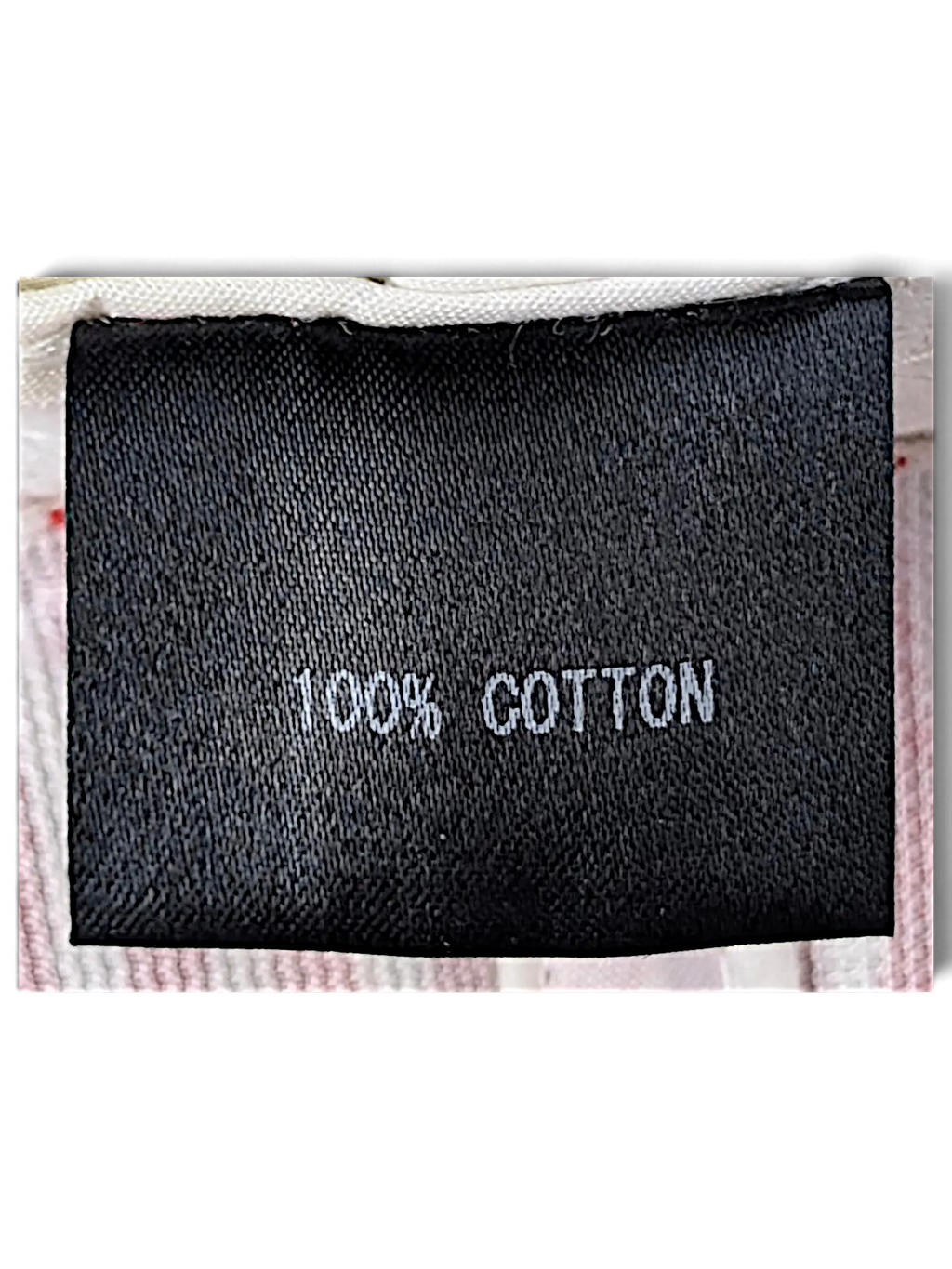 JAKE & IPI IBE Time Is On bucket hat black fabric care label showing 100% cotton material composition