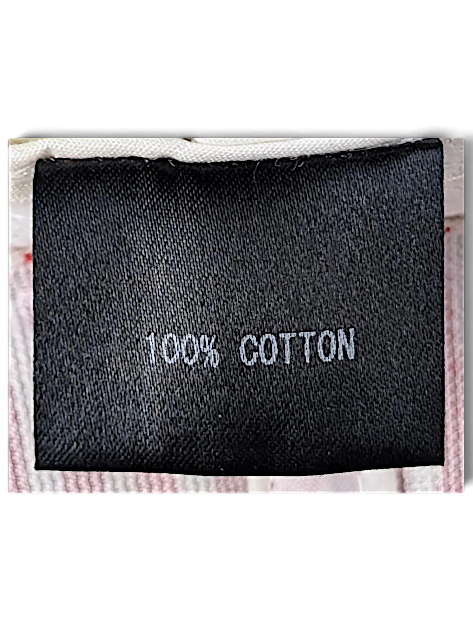JAKE & IPI IBE Time Is On bucket hat black fabric care label showing 100% cotton material composition