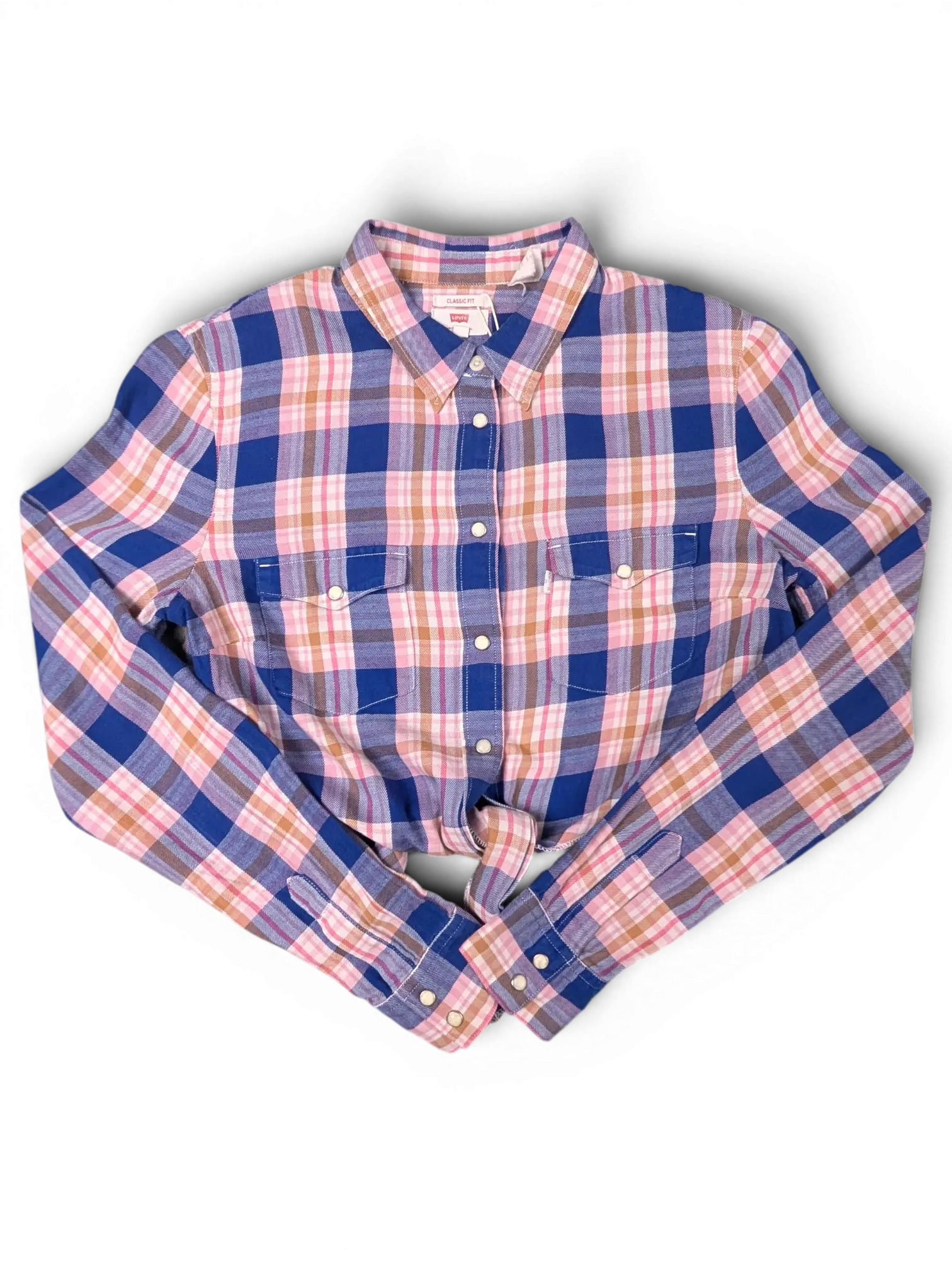 JAKE & IPI vintage cropped plaid long sleeve shirt in blue, pink, and beige with snap chest pockets and raw hem.
