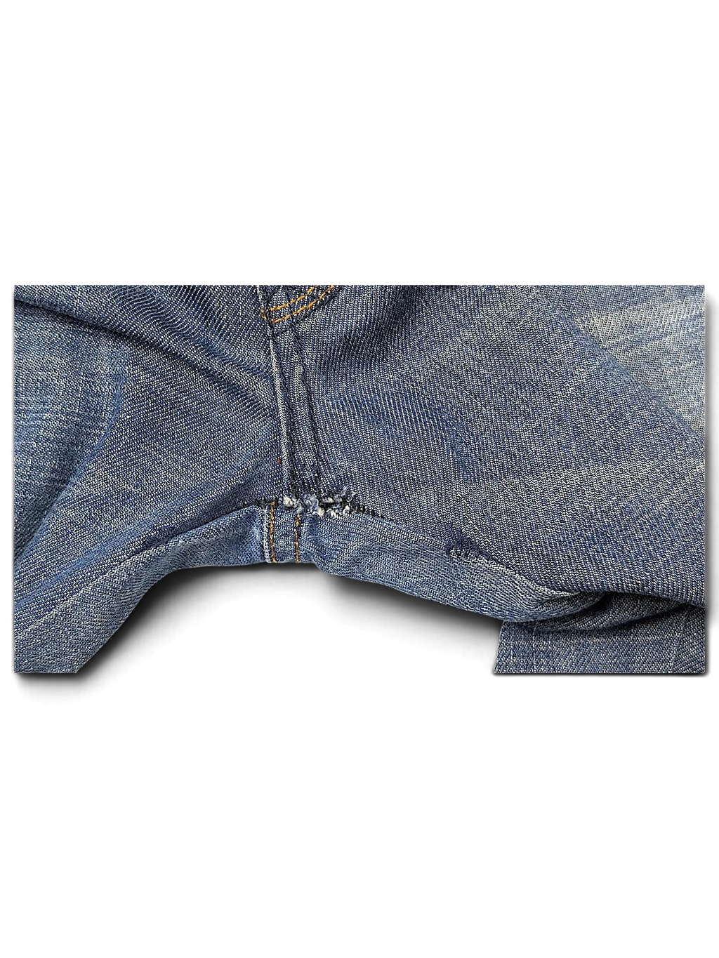 JAKE & IPI Cross Jeanswear co blue denim jeans showing crotch area with visible fabric wear and stitching detail