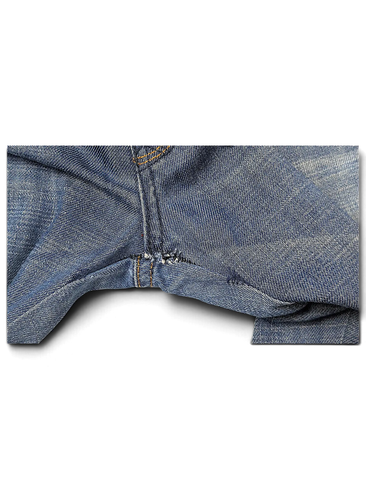 JAKE & IPI Cross Jeanswear co blue denim jeans showing crotch area with visible fabric wear and stitching detail
