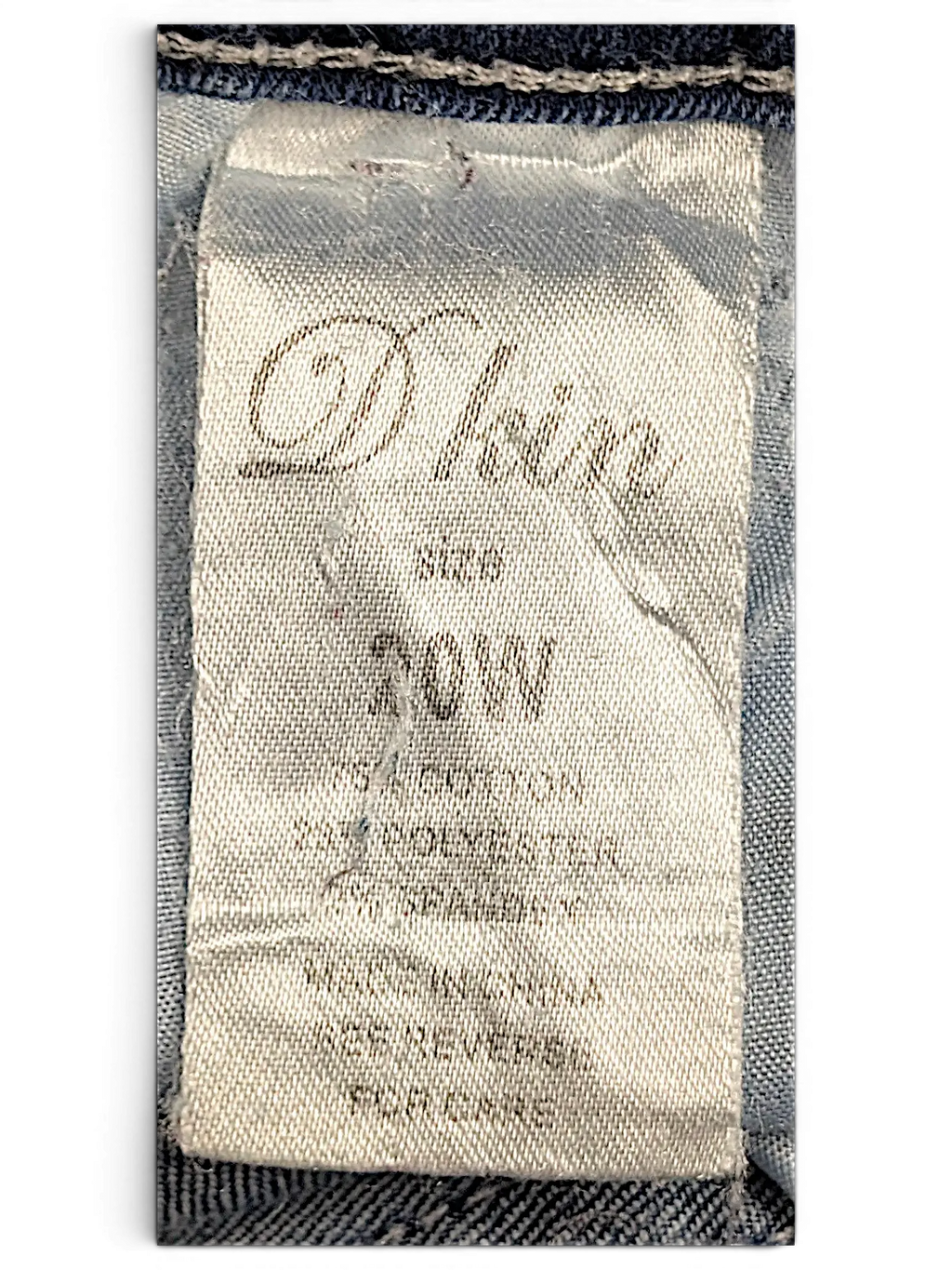 JAKE & IPI D Kin jeans size 20W clothing tag showing cotton and polyester blend fabric details