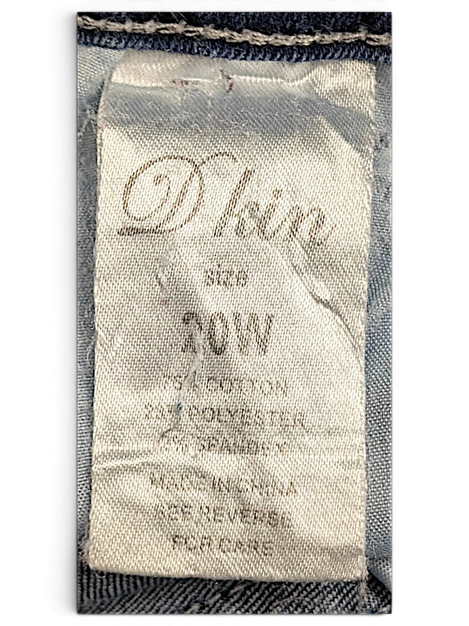 JAKE & IPI D Kin jeans size 20W clothing tag showing cotton and polyester blend fabric details