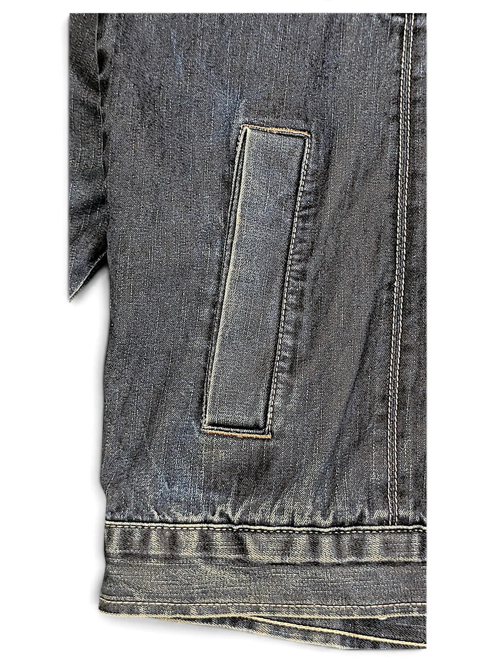 Close-up of a JAKE & IPI Johnny Blaze dark blue denim jacket featuring visible stitching and a vertical side pocket.