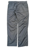JAKE & IPI Cower dark green cargo pants featuring a durable synthetic fabric and reinforced knee panels.
