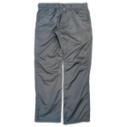 JAKE & IPI Cower dark green cargo pants featuring a durable synthetic fabric and reinforced knee panels.