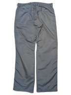 JAKE & IPI Cower dark green cargo pants featuring a reinforced seat panel and back pockets on a black background.