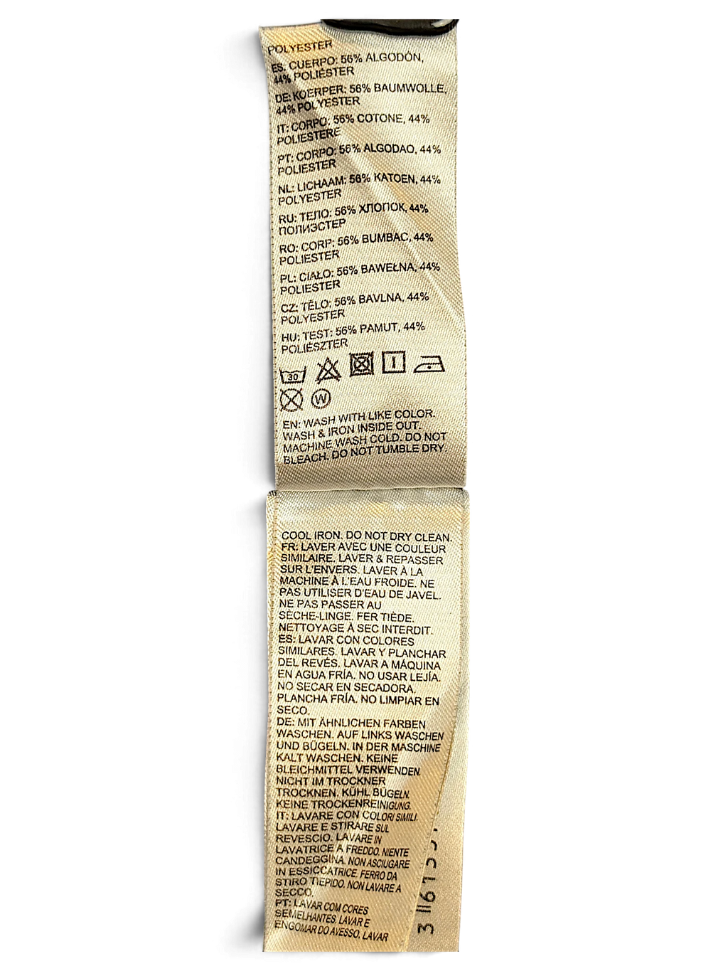 JAKE & IPI DC track pants care label showing 56% cotton and 44% polyester composition and laundry instructions