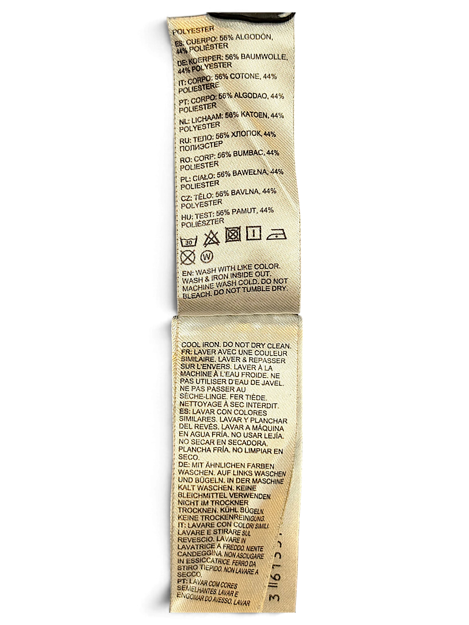 JAKE & IPI DC track pants care label showing 56% cotton and 44% polyester composition and laundry instructions