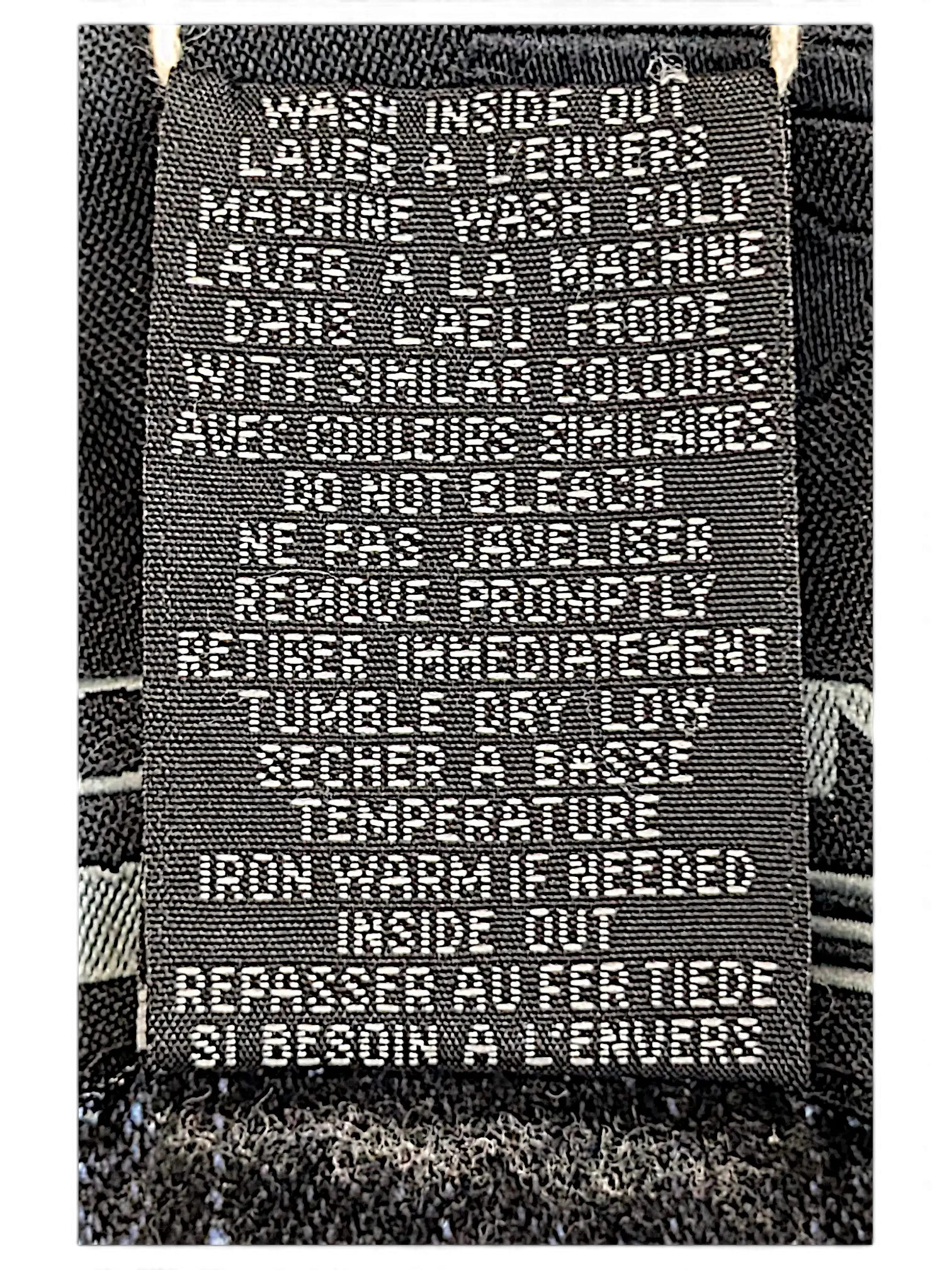 JAKE & IPI Johnny Blaze denim jacket black care label with white bilingual washing instructions