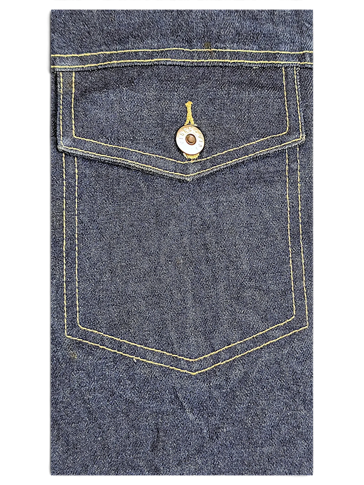 JAKE & IPI Vibes denim vest featuring a dark blue chest pocket with contrasting yellow stitching and a metal button.