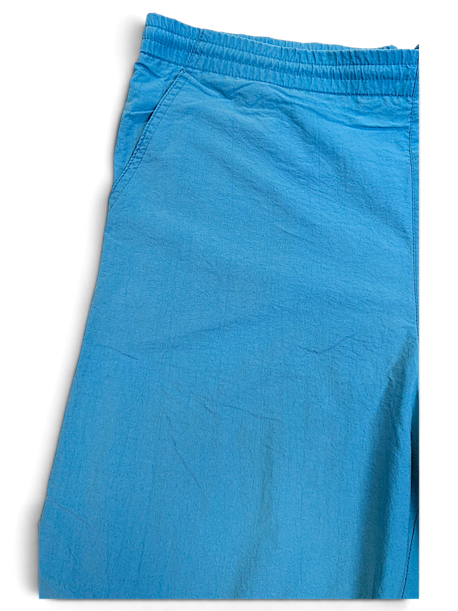 JAKE & IPI pre-owned Diadora faded light blue track pants with an elasticated waistband and relaxed fit.
