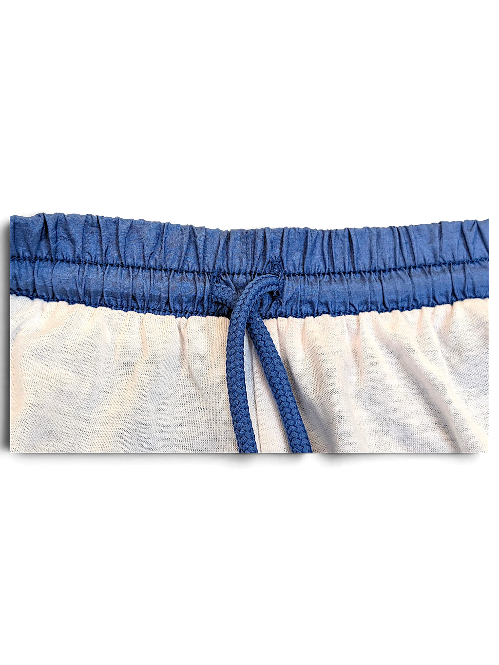JAKE & IPI Diadora light blue track pants featuring an elasticated waistband with a matching drawstring closure.