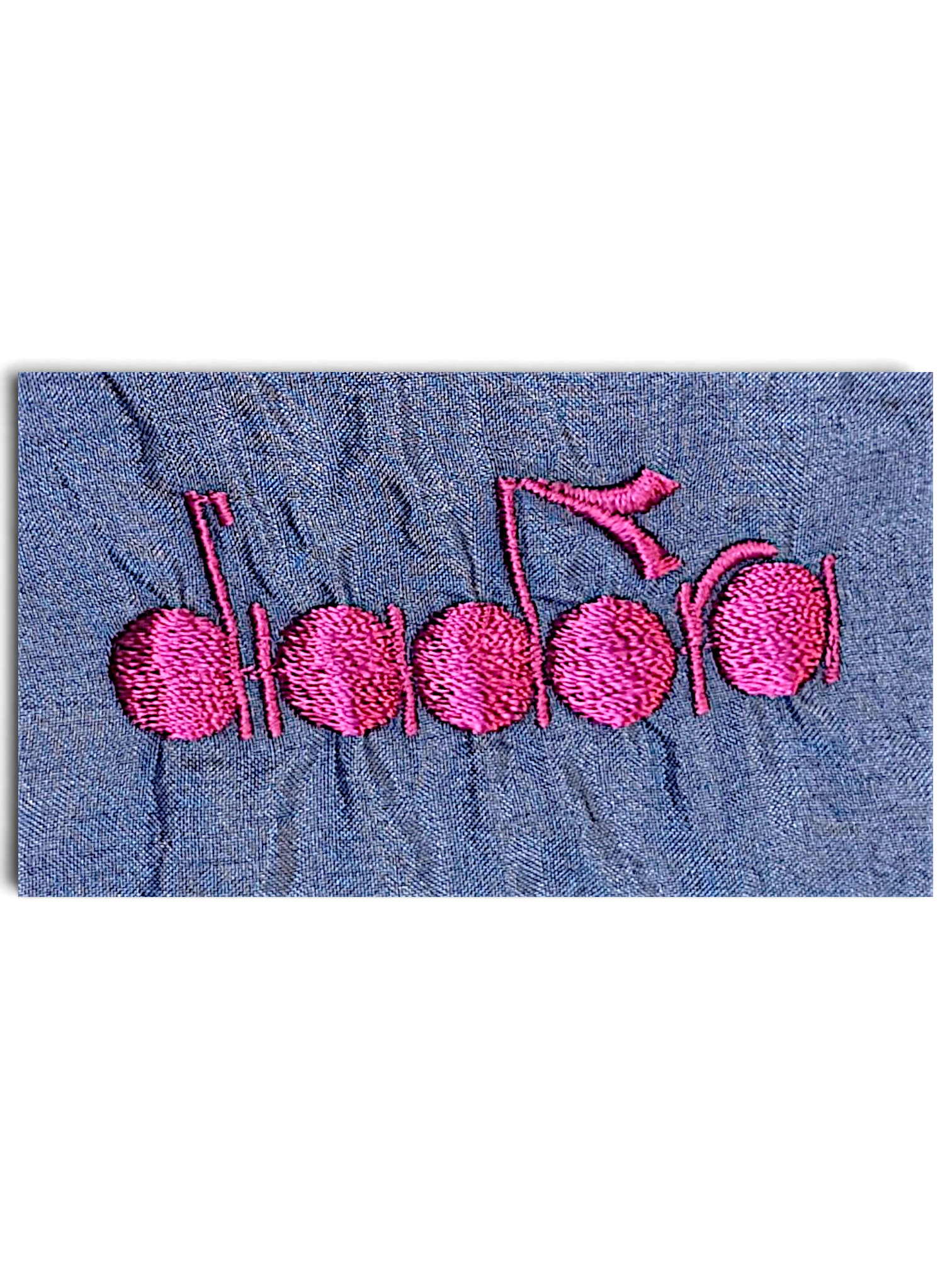 JAKE & IPI Diadora track pants featuring bright pink embroidered logo on shiny light blue fabric