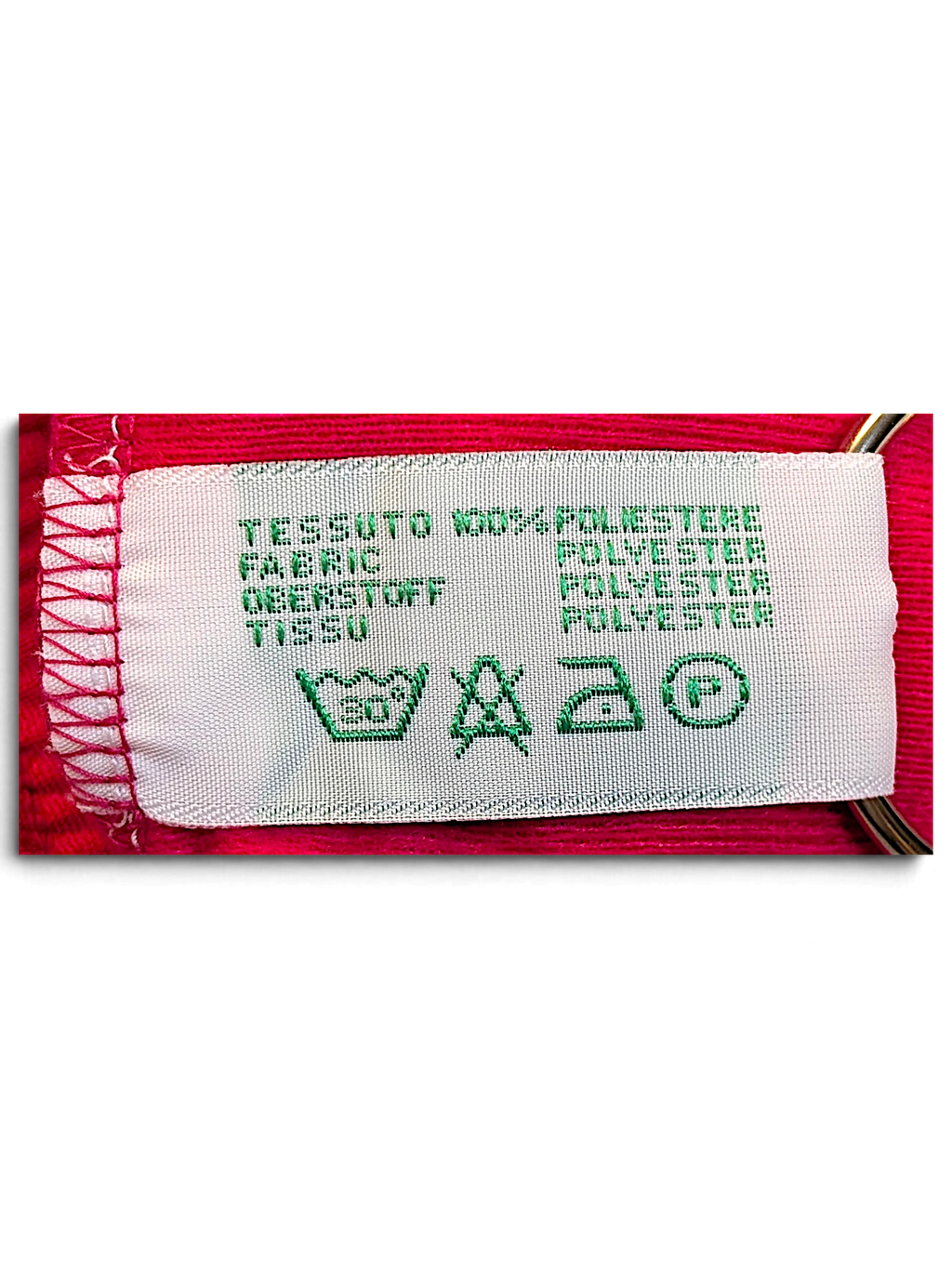 JAKE & IPI Diadora pink polyester track pants care label with washing instructions