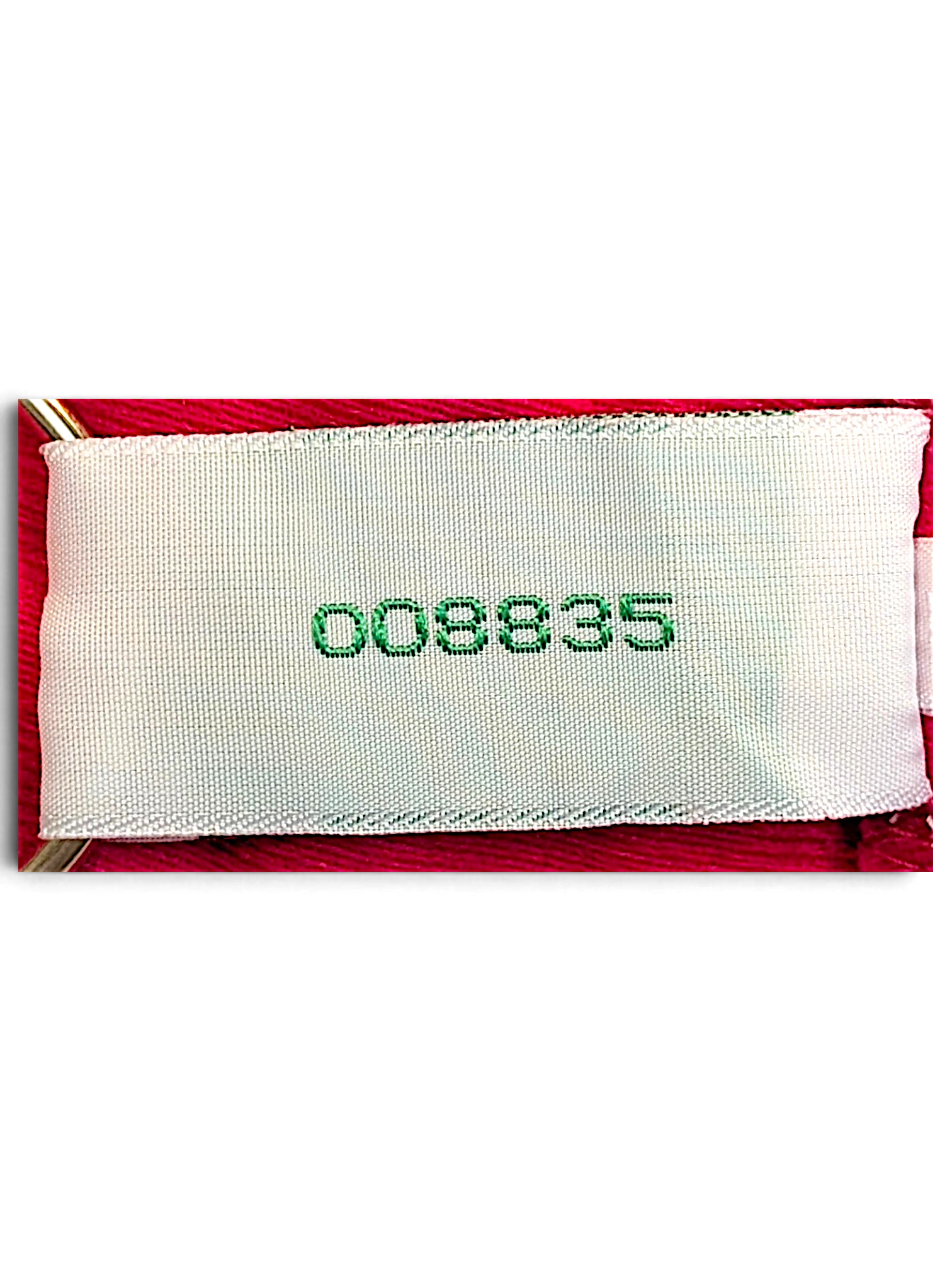 JAKE & IPI Diadora pink track pants internal garment tag with green serial number 008835