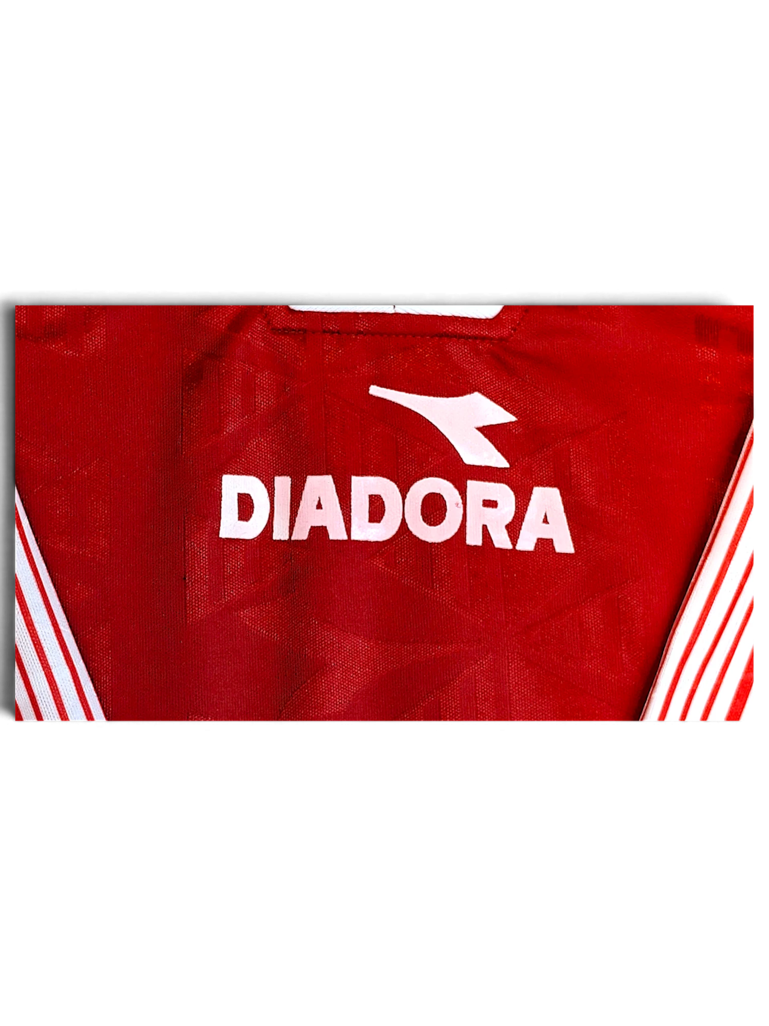 JAKE & IPI Diadora Grit red football jersey with embroidered chest logo and tonal geometric fabric
