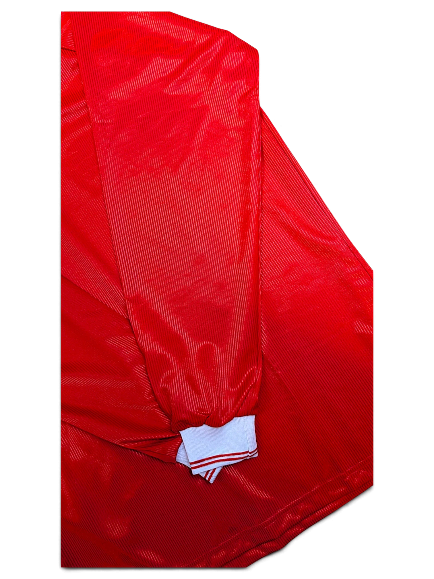 JAKE & IPI Diadora Roma red football shirt showing the white striped ribbed cuff