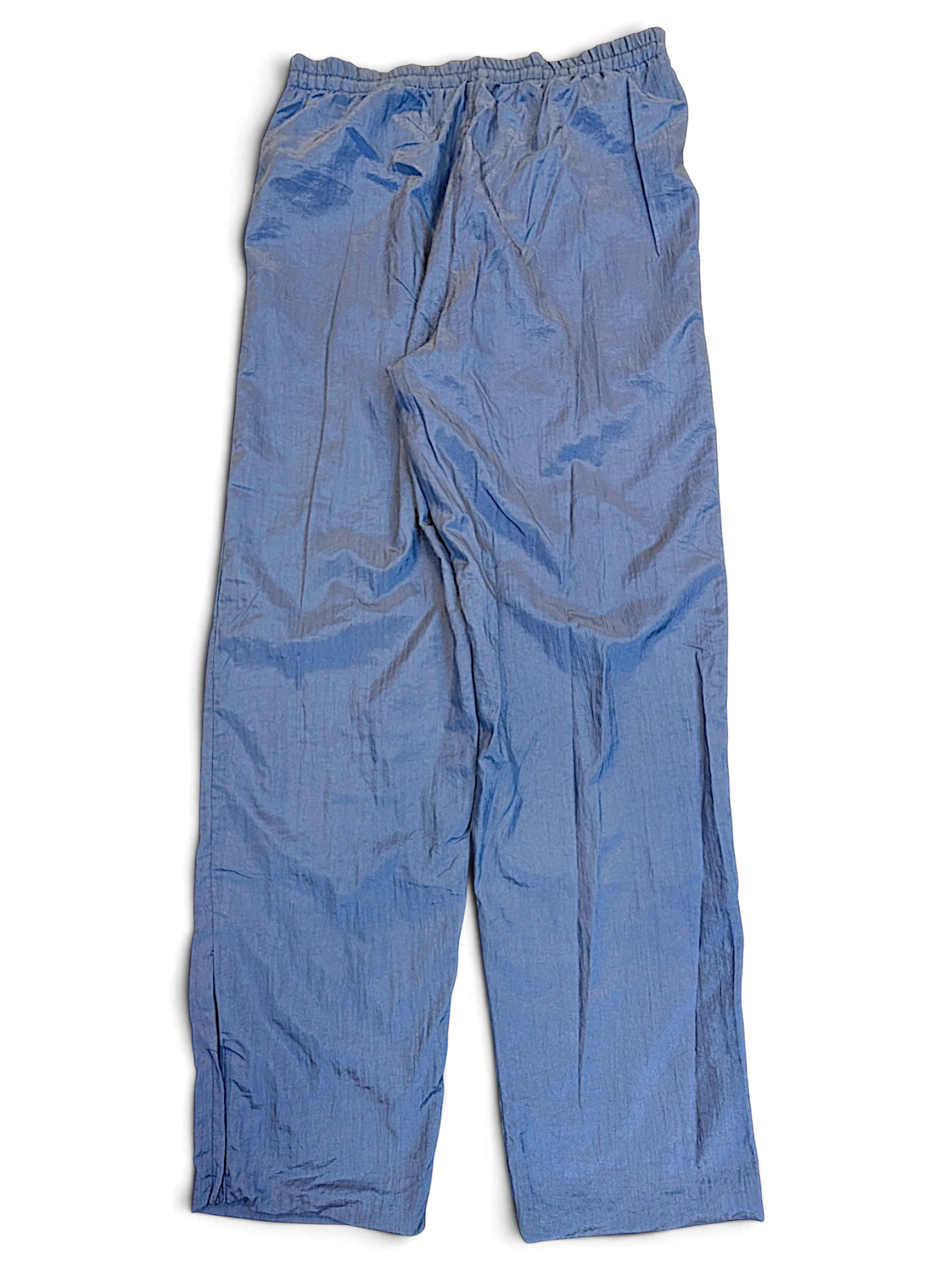 JAKE & IPI pre-owned Diadora light blue track pants with a shiny finish and relaxed leg fit.