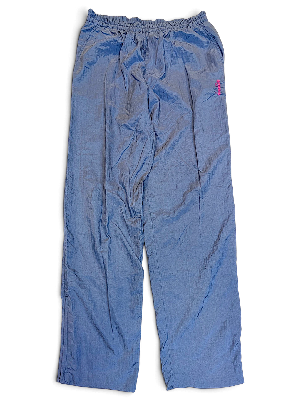 JAKE & IPI pre-owned Diadora light blue track pants with a shiny finish and embroidered branding on the hip.