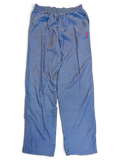 JAKE & IPI pre-owned Diadora light blue track pants with a shiny finish and embroidered branding on the hip.