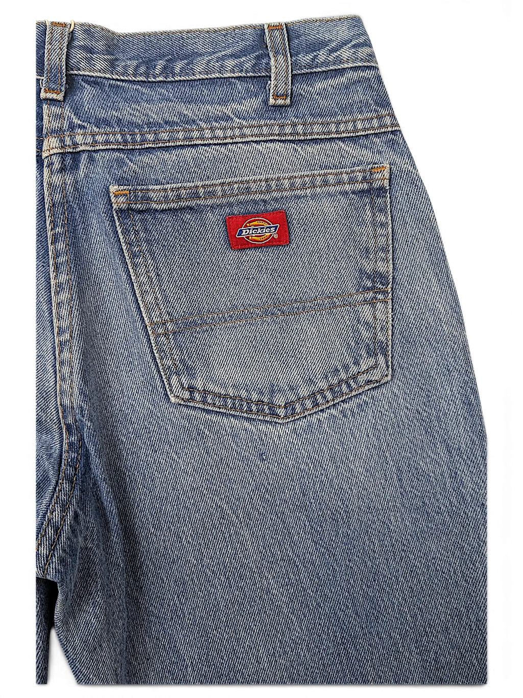 JAKE & IPI Dickies blue denim jeans featuring a classic five-pocket construction and a red logo patch on the back.
