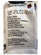 JAKE & IPI Dickies trousers care label with washing instructions and supplier information