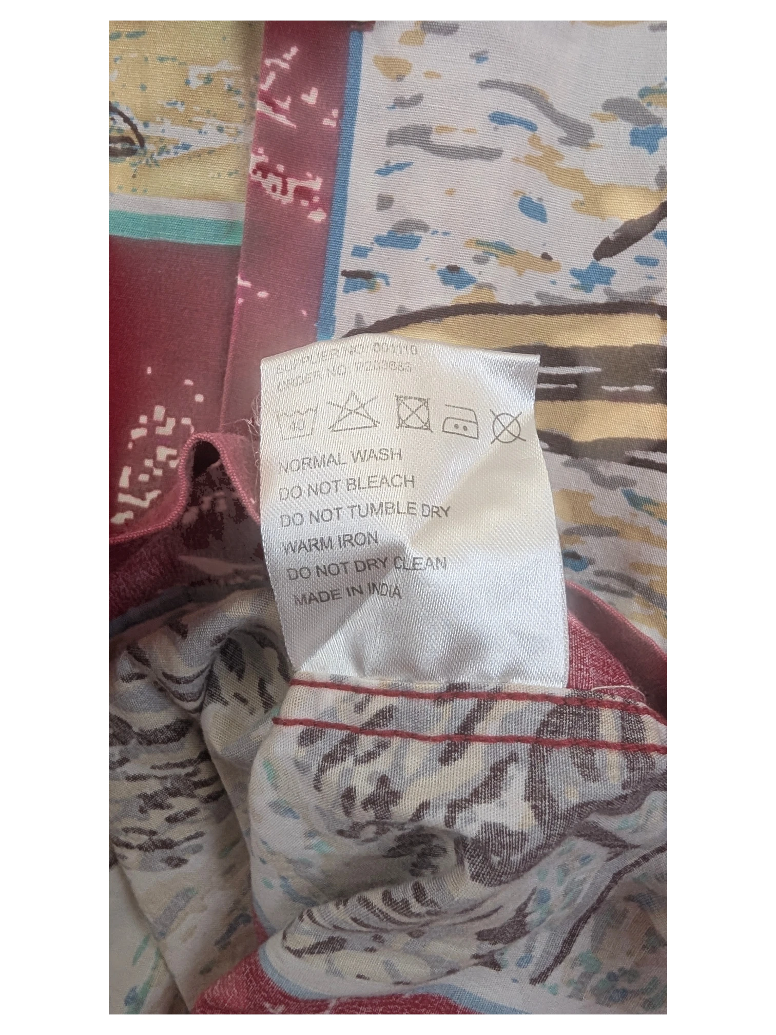 JAKE & IPI Dickies Hawaiian shirt care label with washing instructions and Made in India origin
