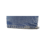 Close-up of the frayed hem on blue denim JAKE & IPI Dickies jeans showing authentic wear and texture.