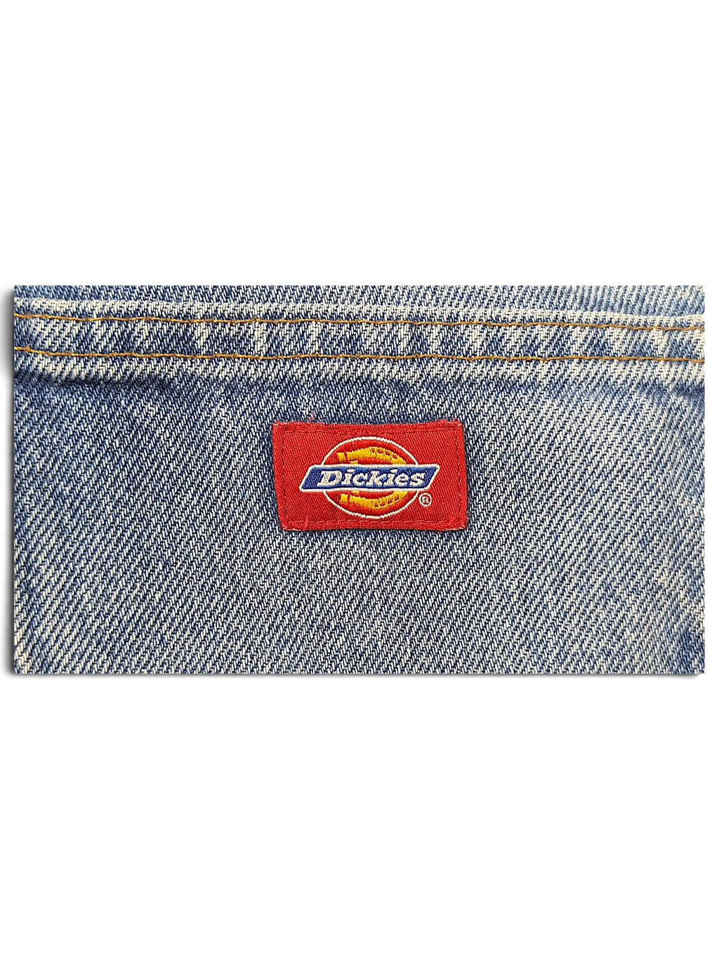JAKE & IPI Dickies jeans featuring a classic red brand logo patch stitched onto blue denim fabric.