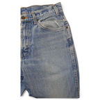 JAKE & IPI Dickies jeans in light wash denim featuring a classic five-pocket construction and metal rivet details.