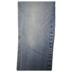 JAKE & IPI Dickies light wash denim jeans featuring a classic five-pocket construction and durable stitching.