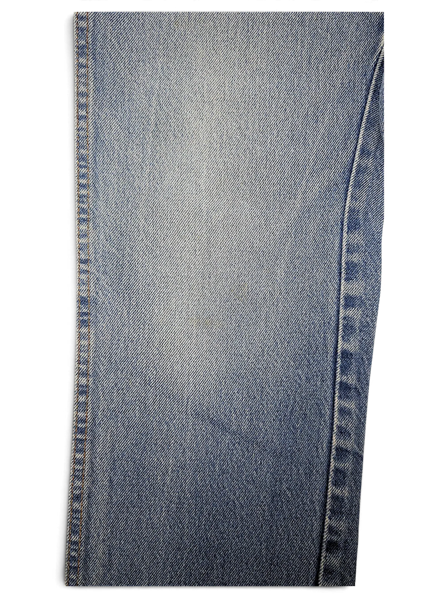 JAKE & IPI Dickies light wash denim jeans featuring a classic five-pocket construction and durable stitching.