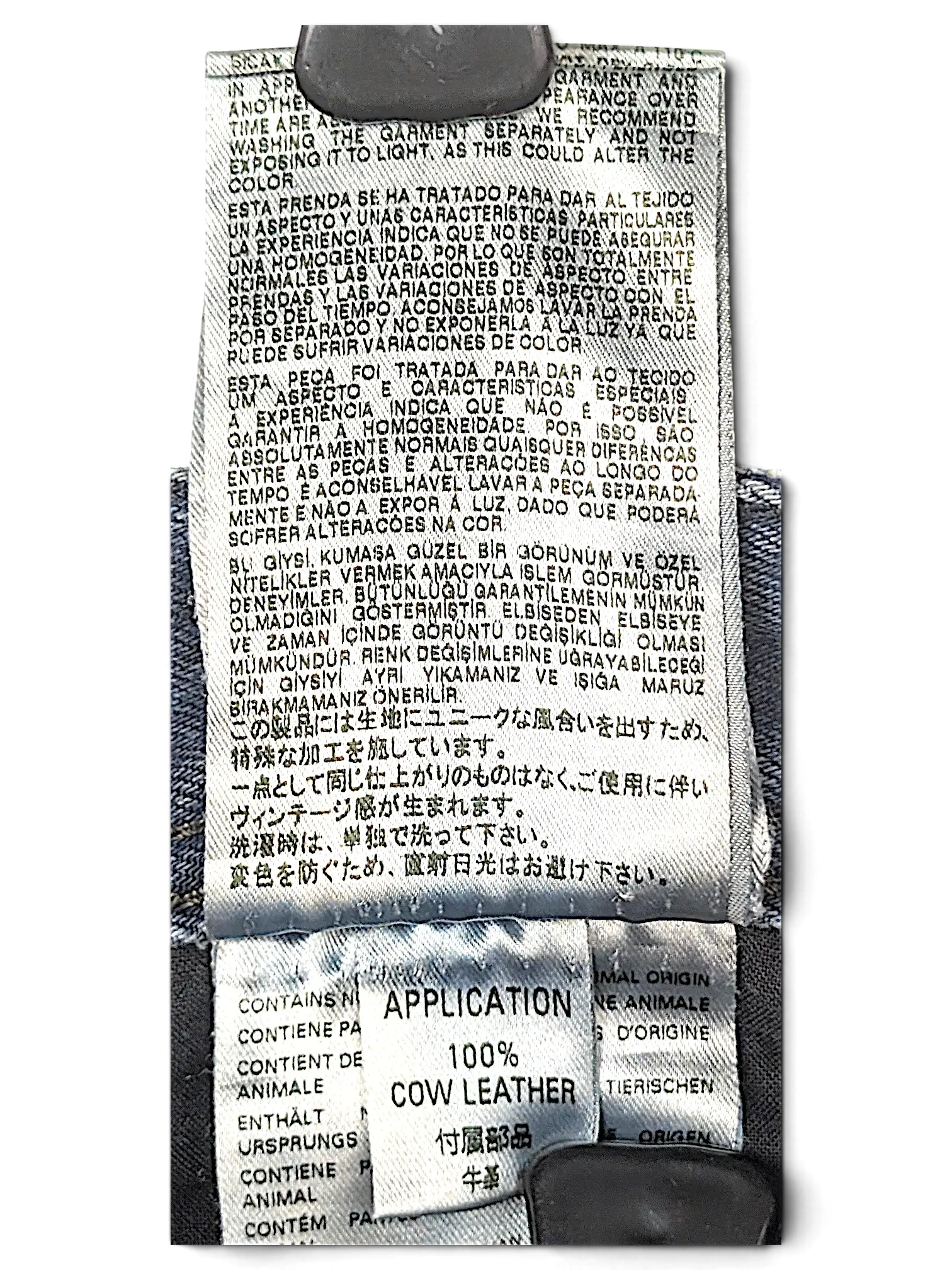 JAKE & IPI Diesel Krayer jeans care label showing 100 percent cow leather application details in multiple languages