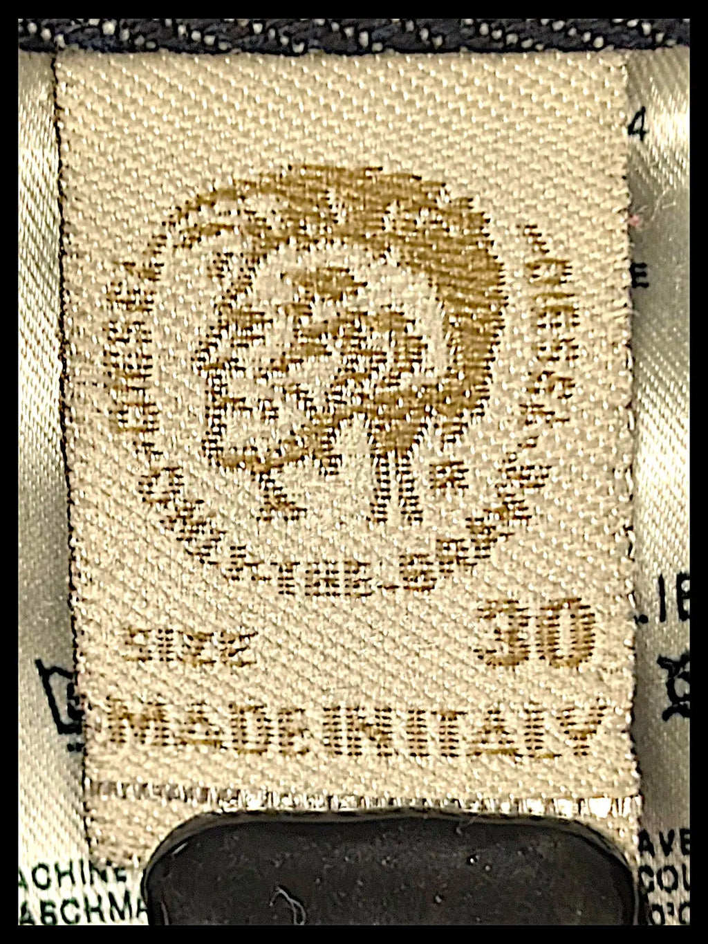 JAKE & IPI Diesel Krooley jeans internal care label showing size 30 and Made in Italy branding