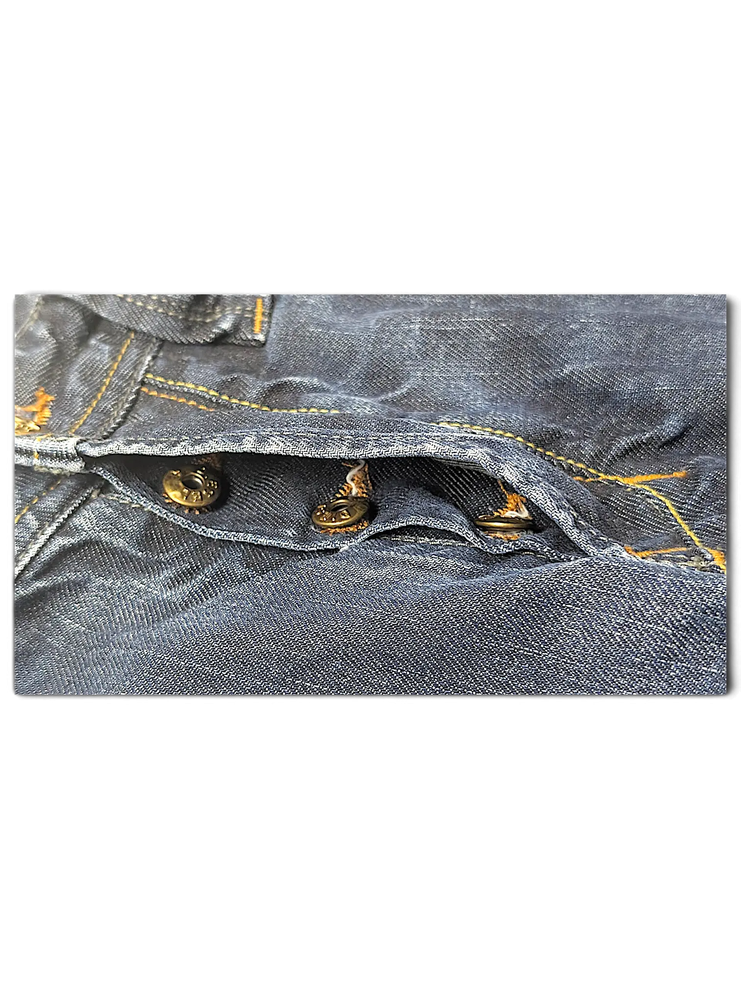 JAKE & IPI Diesel Larkee dark blue denim jeans featuring a classic button fly closure with branded metal buttons.