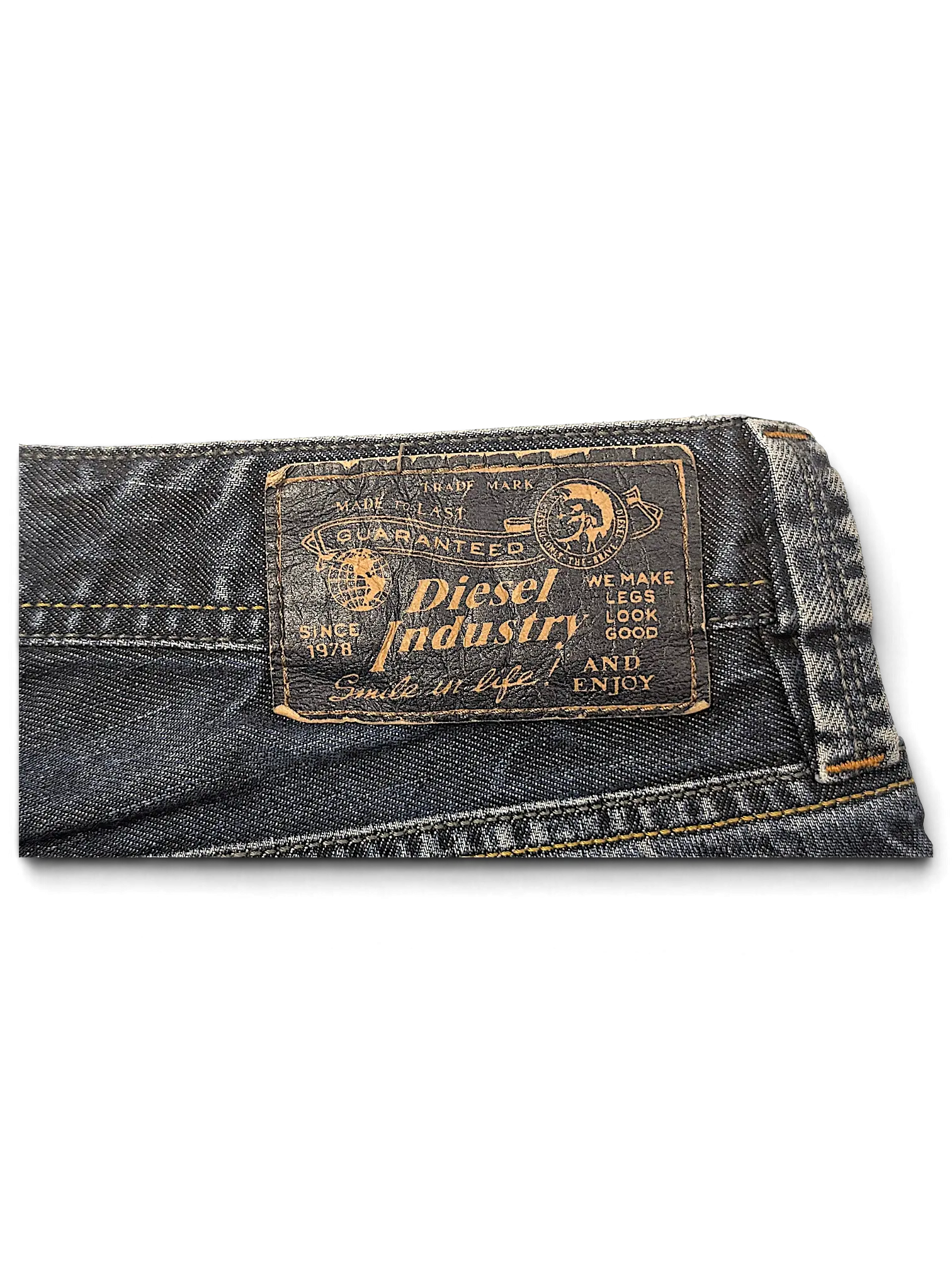 JAKE & IPI Diesel Larkee jeans featuring a dark blue denim fabric and a branded leather back waist patch.