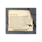 JAKE & IPI Diesel charcoal grey shirt care label with multi-language washing instructions