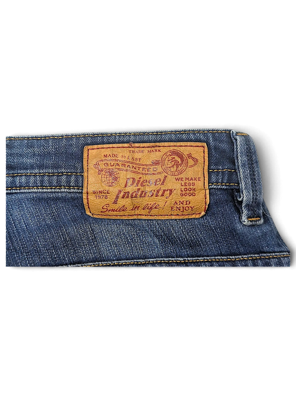 JAKE & IPI Diesel Thavar denim jeans featuring a brown leather brand patch on the back waistband
